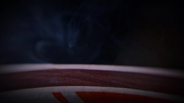 Slow Motion Extreme Close-Up Footage of a Match Striking the Flint on a Matchbook, with Smoke and Flame