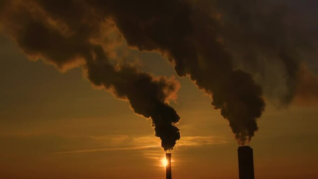 Factory pipe polluting air time lapse, environmental problems. Industrial factory pollution, smokestack exhaust gases. Industry zone, thick smoke. Climate change, ecology, atmoshere gas, ozone layer
