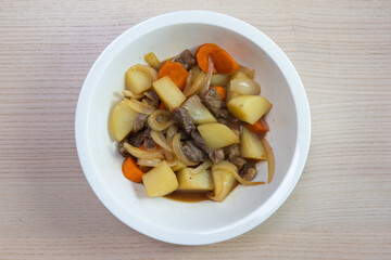 A bowl of meat and potato stew.