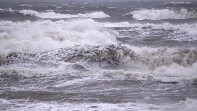 Intense sea storm waves crushing in slow motion