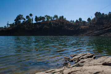Fototapeta na wymiar beautiful fresh water lake in himachal pradesh, India