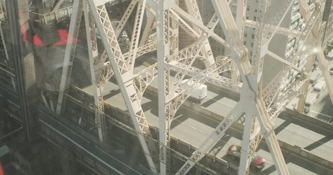 A shot out of the Roosevelt Island Tramway as it passes next to the Ed Koch Bridge