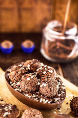 brazilian easter dessert, chocolate egg with cream filling, brazilian brigadier bonbons, biscuit and sugar, called a spoon egg
