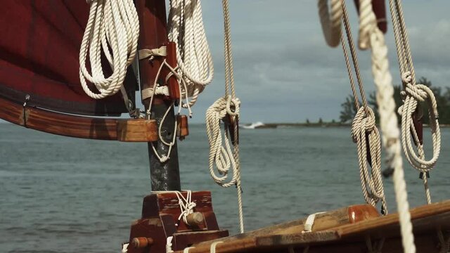 Detail View Of Backstay, Ropes And Mast From A Polynesian Double-hulled Voyaging Canoe (Catamaran) - Static Medium Close Up Detail Shot