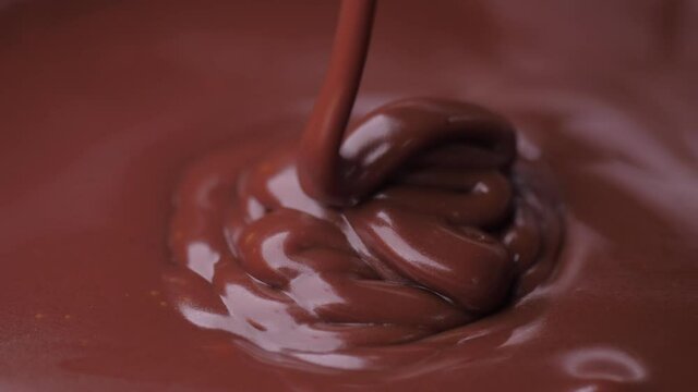 pouring melted chocolate 4k