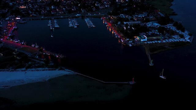 Beautiful Night color sky, sunset by the Baltic Sea, Jastarnia, Poland. Harbor. Aerial View