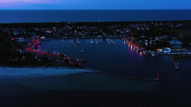 Beautiful Night color sky, sunset by the Baltic Sea, Jastarnia, Poland. Harbor. Aerial View