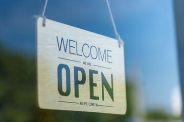Open sign broad through the glass of door in cafe ready to service., Business service and food concept.