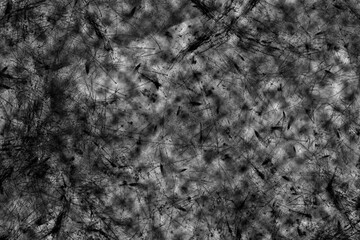 Abstract illustration of black grunge effect texture overlay on grey background