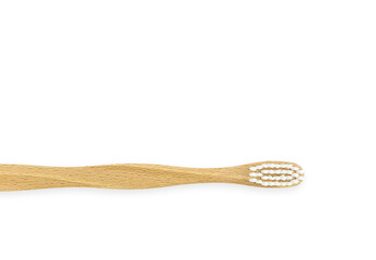 Wooden bamboo toothbrush isolated on white background with copy space