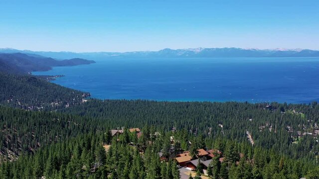 A drone circles above the highest neighborhood on the mountain overlooking the vast Lake Tahoe. At the time of flying the drone, I was drinking an Old Fashioned on the deck of the house in the video.
