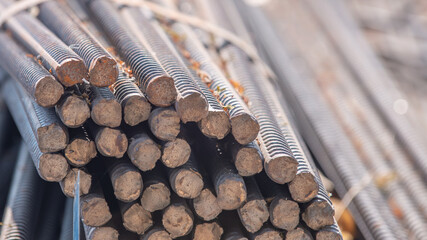 Construction worker Making Reinforcement steel rod and deformed bar with rebar at construction site.