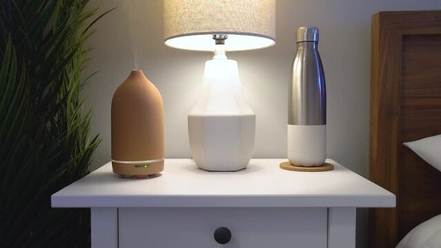 Essential oils diffuser humidifier for aroma therapy at home spa wellness; slow motion