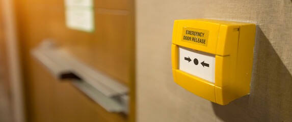 Close up the emergency switch for fire exit door or fire escape on the building for doorway exit....