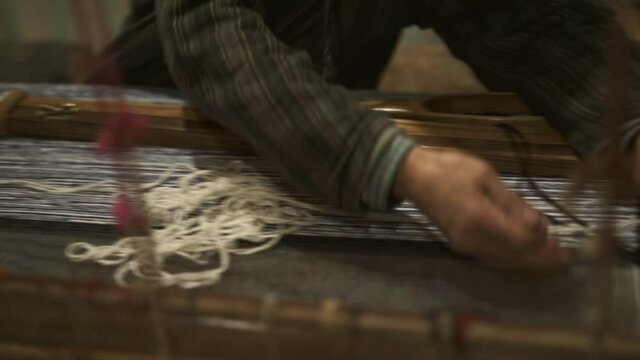 Traditional Moroccan Berber weaving technique, ecotourism handmade clothing