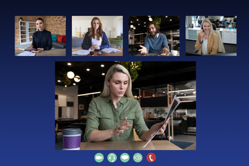 Diverse businesswomen and businessman waving on computer screen during video call