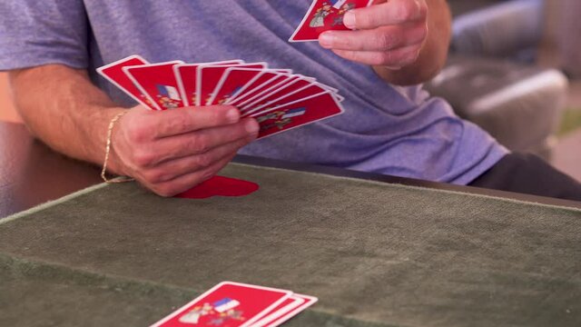 Playing french cards on the table 