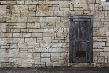 old wooden door in wall