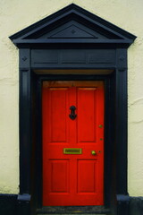 Red door with black doorway