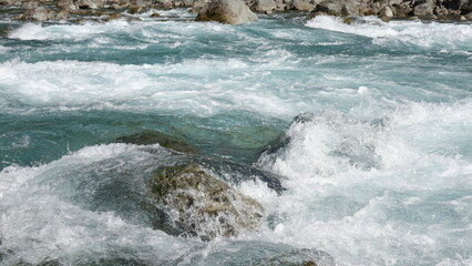 water flowing into the rocks