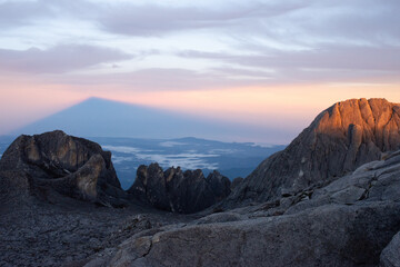 stone and sun rising in Mount Kinabalu