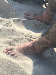 feet on the beach