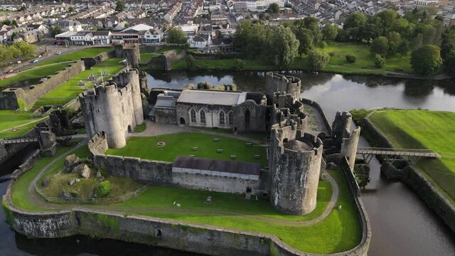 Moated castle in centre of Caerphilly town, Southern Wales, UK, Aerial panorama