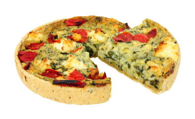 Spinach and red pepper quiche with feta cheese isolated on a white background