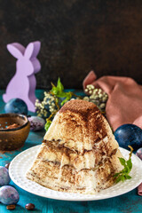 Easter background. Dessert tiramisu Easter cottage cheese  pascha on festive table. Copy space.