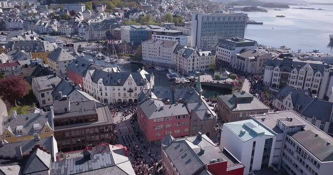 Truly amazing drone footage of Alesund, Norway's most beautiful town and reveals the art nouveau architecture, the breathtaking nature and the people marching on the streets on national day.