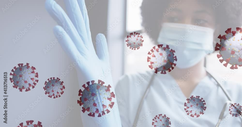 Poster Animation of covid 19 cells with female doctor wearing mask putting on gloves