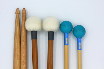 Percussion mallets set on a white background.