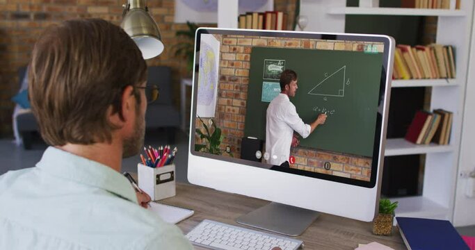 Caucasian male student using computer on video call with male teacher
