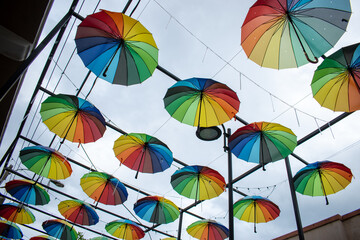 Fototapeta na wymiar hanging colorful umbrellas