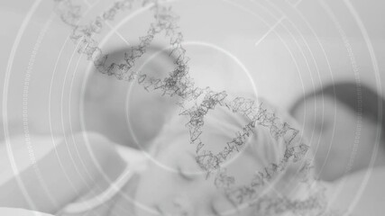 Animation of 3d dna strand spinning and scope scanning over sleeping family - Powered by Adobe