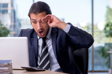 Young businessman employee working in the office