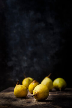 Close-up of pears on wooden table