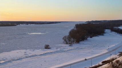 top view of the frozen Vistula River at sunset in Płock, Poland 