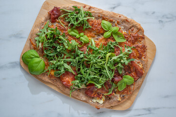 healthy green whole grain pizza with vegetables