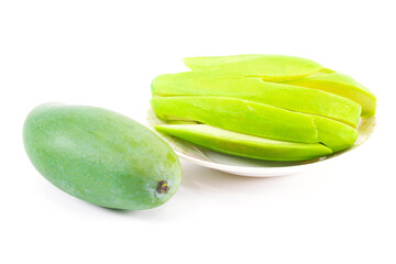 A raw mango fruit on a white background