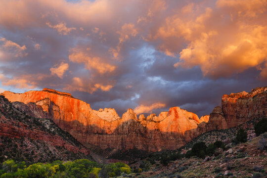 Low angle idyllic view of mountain ranges against cloudy sky at Zion National Park