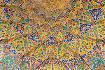 Colorful ceiling kashi-kari or faience tile mosaic decoration on ancient mughal era tomb of Asif Khan in Lahore, Punjab, Pakistan