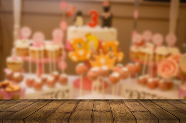 Empty wood table. Composition with many different candies on table. Space for text