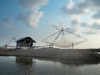 Fototapeta na wymiar A local fisherman's house and big fishing net.