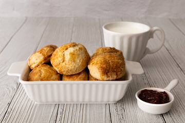homemade scones with a cup of milk