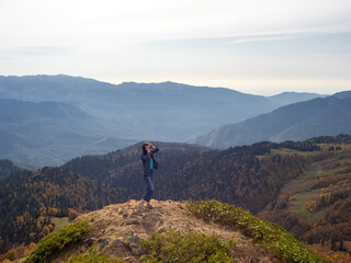 Hiking in the mountains, Enjoy the freedom at the top. Young female