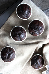 Chocolate muffins in a white baking dish