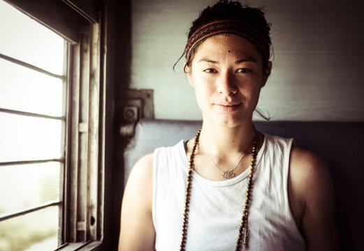 Portrait of woman sitting in train