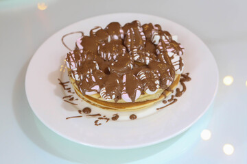 nice wafles with chocolate white background