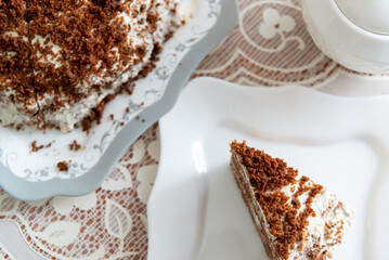 Appetizing homemade cake with coffee biscuit and sour cream